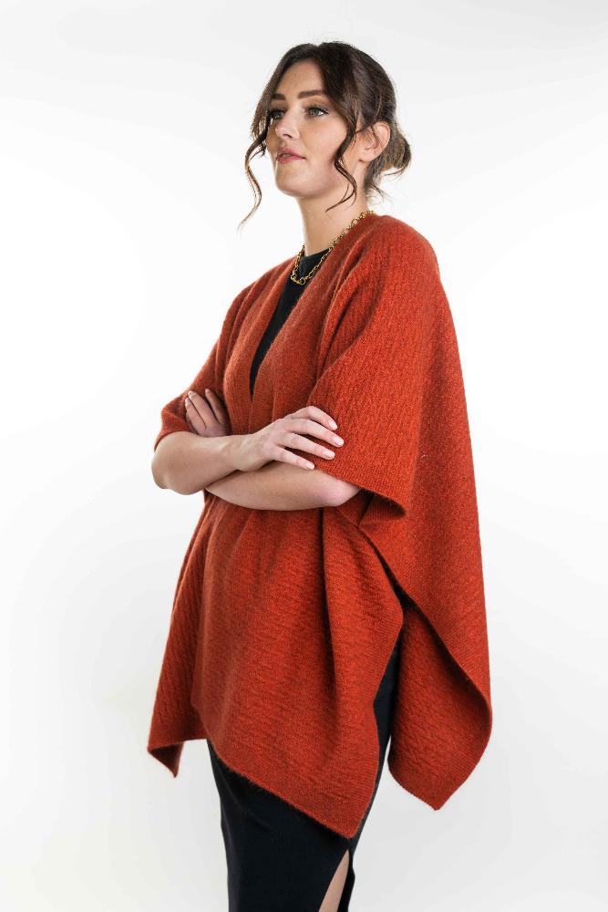 Possum and Merino KO553 Zig Zag Textured Cape - A great throw on and go piece in a detailed zig zag pattern. Available only in size Small or Large Made proudly in New Zealand from a premium blend of 40% possum fur, 50% merino lambswool & 10% mulberry silk.