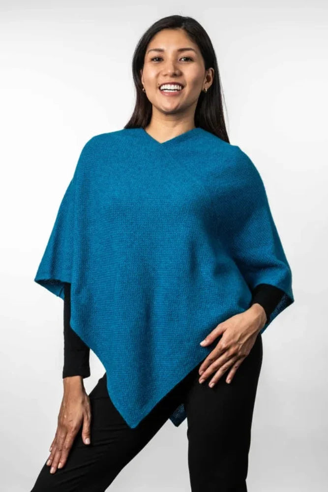 Possum and Merino TR1022 Moss Stitch Poncho - This moss stitch poncho can be worn two different ways, with the hem straight across or on a diagonal. One size only