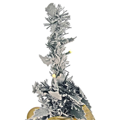 Decorative Christmas tree with silver and gold accents on a white background