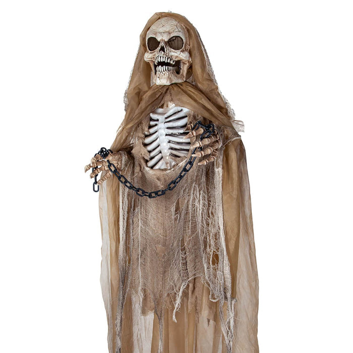 Close up of a hanging Skeleton with hands in chains for Halloween