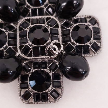 CHANEL BLACK CRYSTAL CROSS WITH LOGO