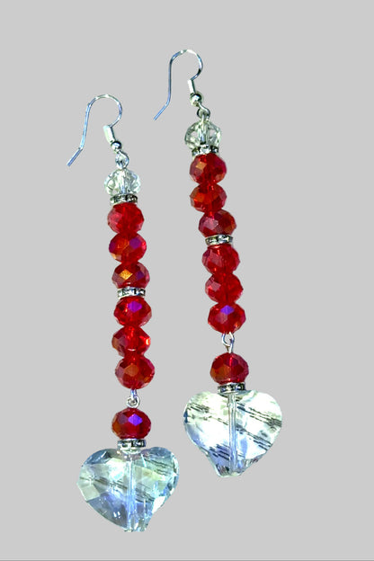 Style the Clear Heart Long Drop Earrings exclusively at Born To Glam