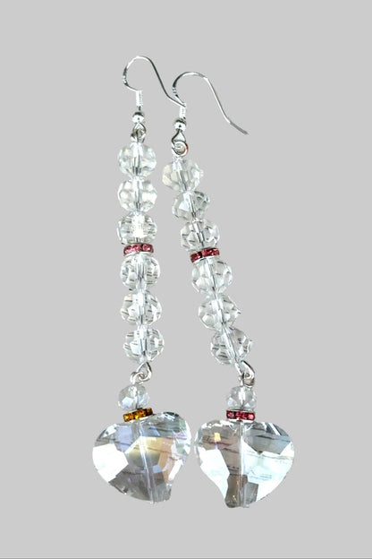 Style the Clear Heart Long Drop Earrings exclusively at Born To Glam