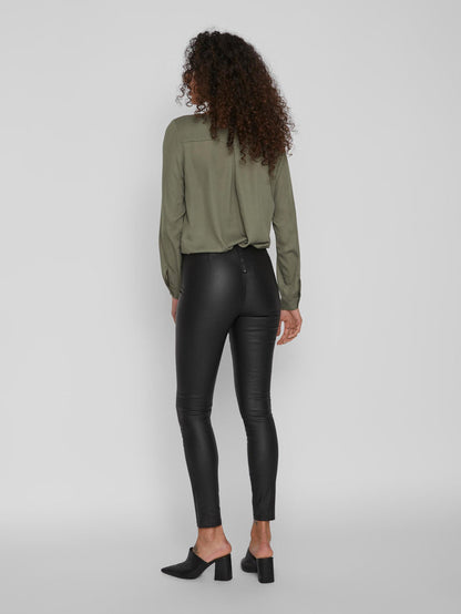 Back of the COMMIT COATED PANTS (BLACK)