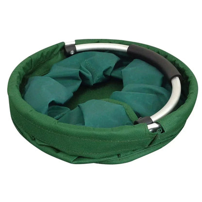 Folded green storage bag with silver handle