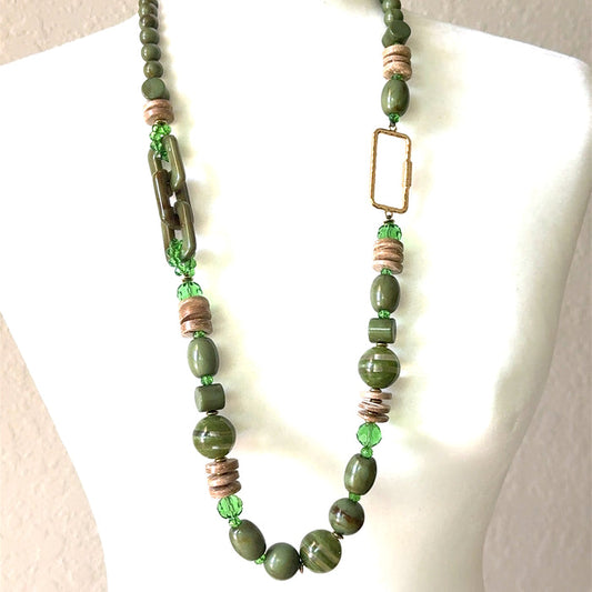 Olive green wooden beaded long necklace with natural bead shapes and an earthy statement jewelry design.