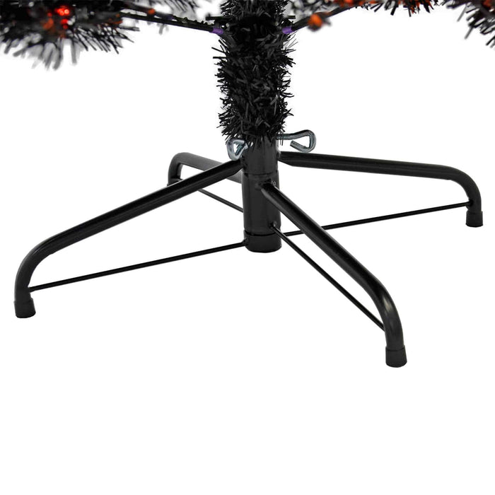 Black metal stand for a black Halloween tree with orange lights
