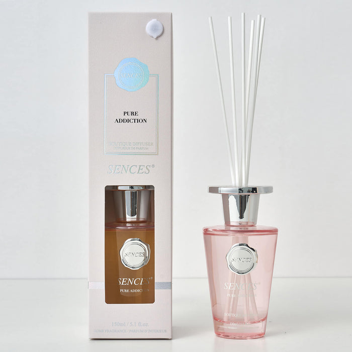 Sences Pure Addiction reed diffuser bottle with packaging on a white background