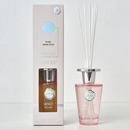 Sences Pure Addiction reed diffuser bottle with packaging on a white background