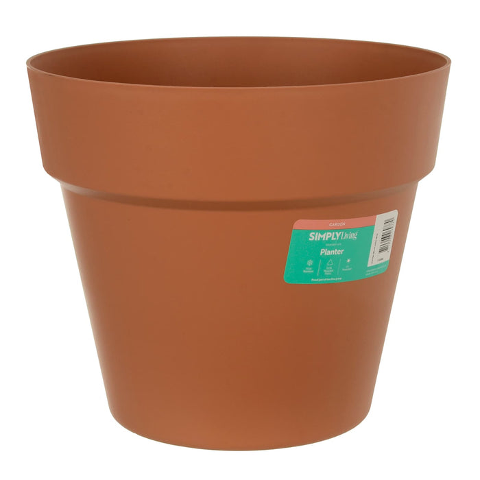 Round terracotta garden planter in plastic
