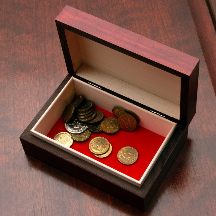 handcrafted wooden box features an American Flag on top. Hinged lid, lined with velvet inside on the bottom