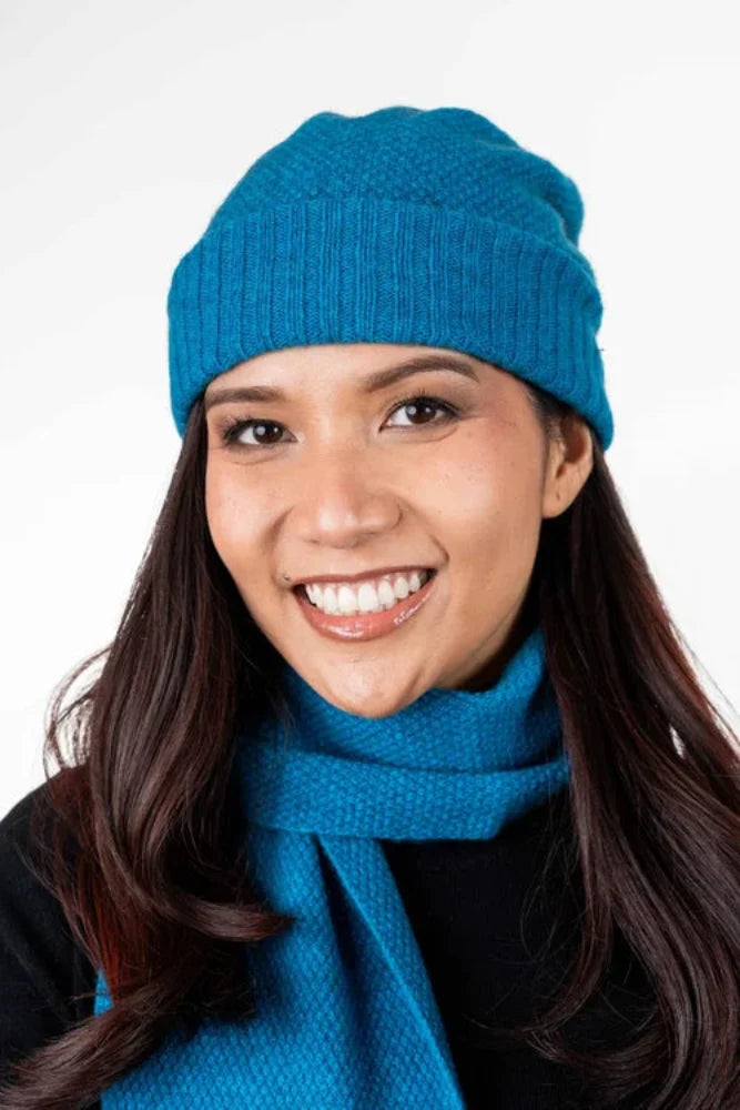 Possum and Merino  TR200 Moss Stitch Beanie - A beanie using moss stitch with a turned back edge.  Makes a set with TR49 Plain Gloves and TR100 Moss Stitch Scarf.   One Size Only   Made proudly in New Zealand from a luxurious blend of 25% possum fur, 65% merino & 10% silk.
