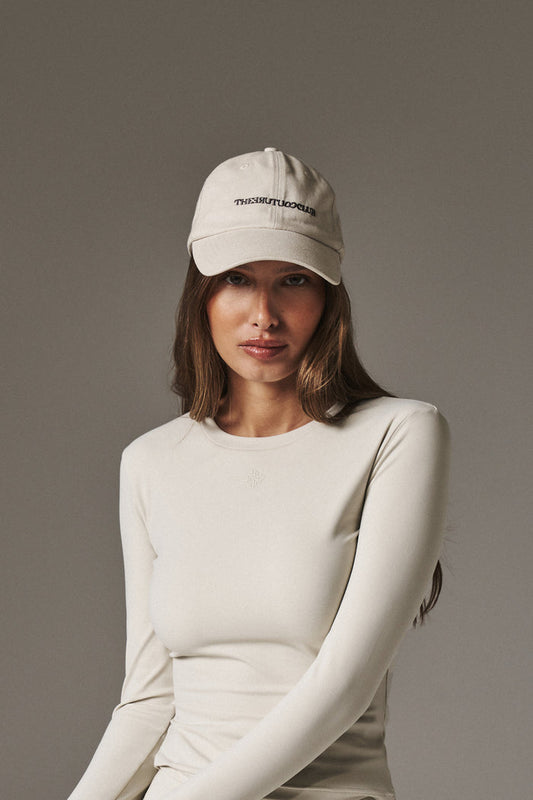 WASHED REVERSE COPYRIGHT CAP - OFF WHITE